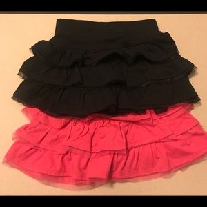 A pink and black toddler skirts